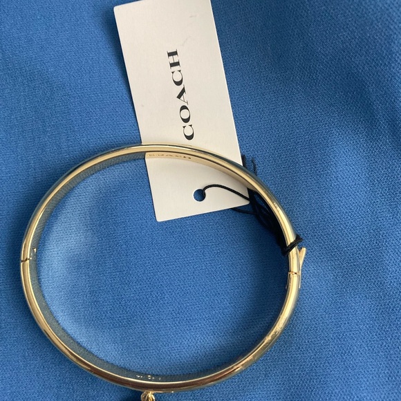 Coach Gold-Tone Bangle Bracelet - Picture 2 of 6